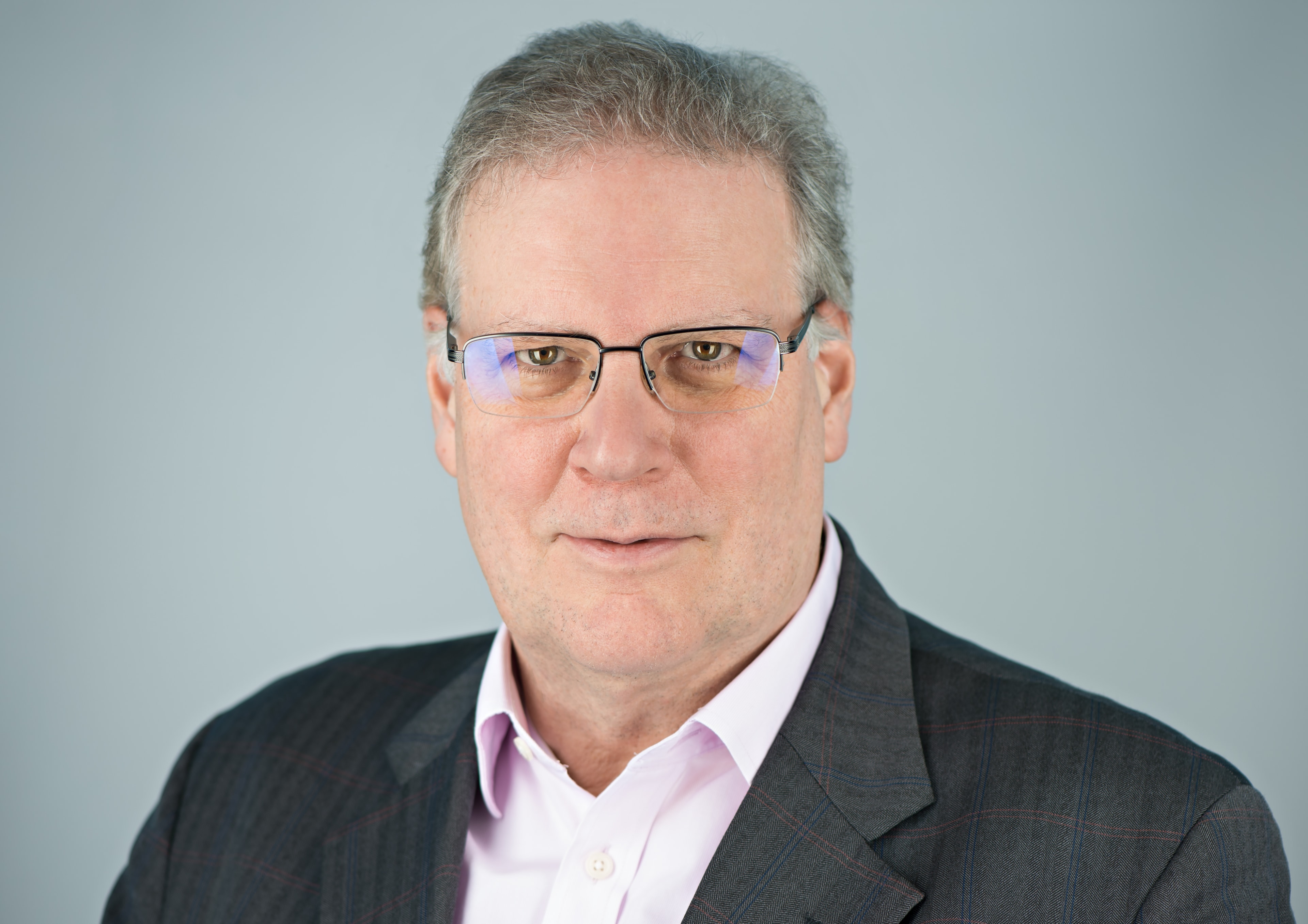 Dr Eric Warner, Founder and Managing Director of Absail Partners
